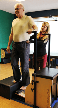 Susan Beth teaching pilates