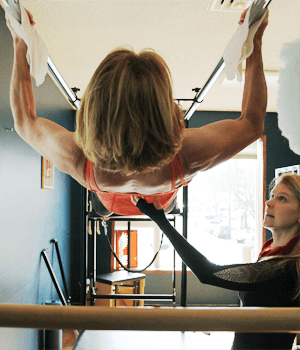 Susan Beth teaching pilates